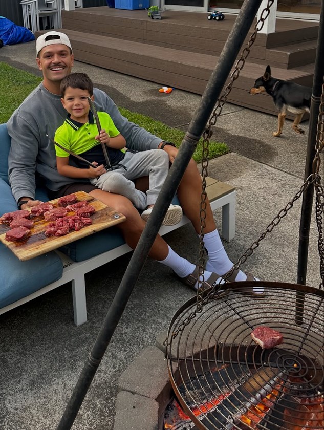 Braidon and son Luca cooking up a feast