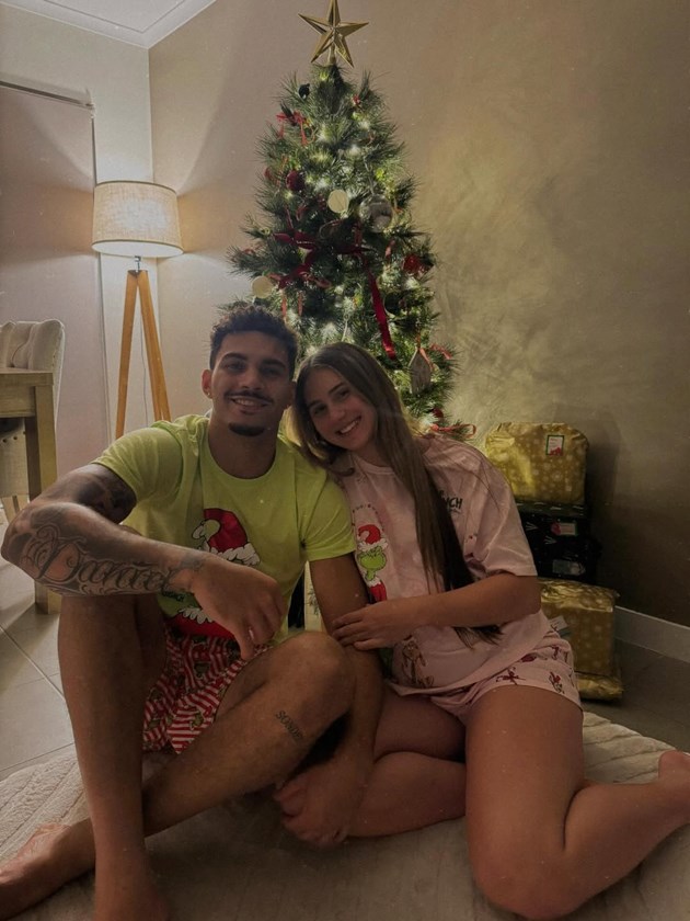 Rob and fiancé Waverly under the Christmas tree