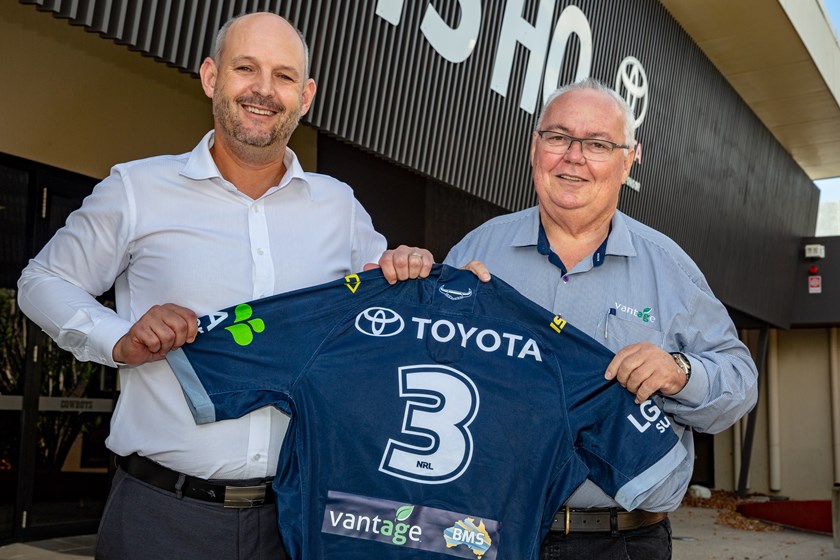 Cowboys CEO Jeff Reibel and Vantage BMS co-founder Lew Brandon with a branded playing jersey