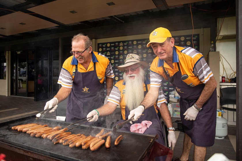 Don [far right] and the Cowboys Supporters Team manned the barbecue at this year's Members Carnival