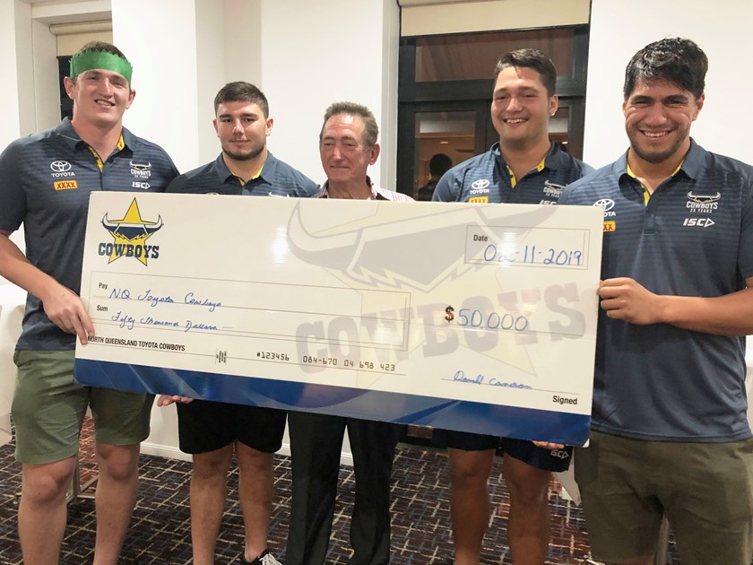 [Pictured from left] Ben Condon, Garrett Smith, Wiremu Greig and Emry Pere received the donation from Don Cameron [centre] and the supporters team at a special presentation