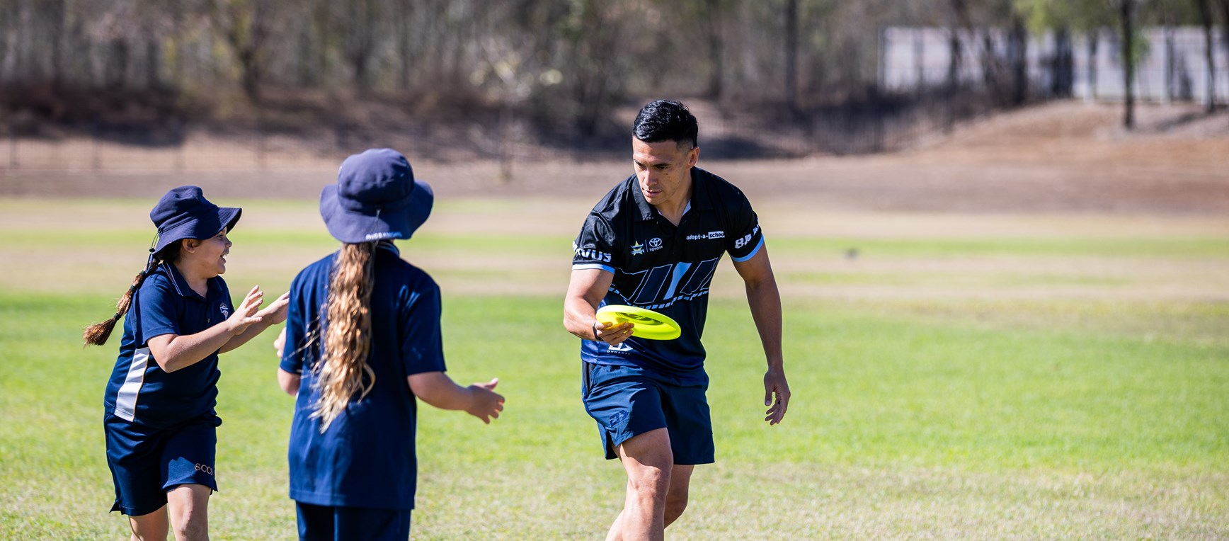 Frisbees fly as Soni joins the schoolyard action
