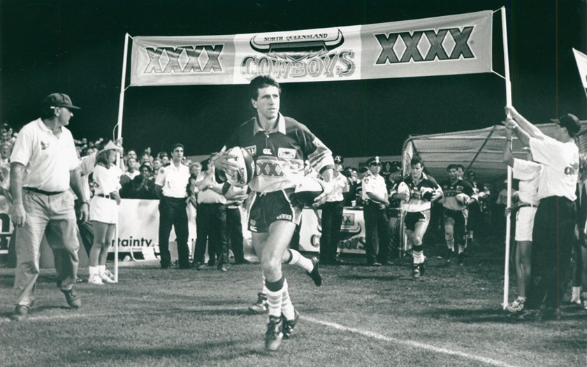 Cowboys inaugural captain Laurie Spina leads the team out for their first game in 1995