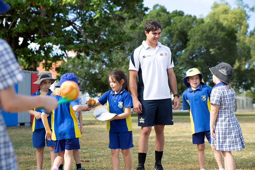 Jake Clifford chatting with students at Railway Estate State School